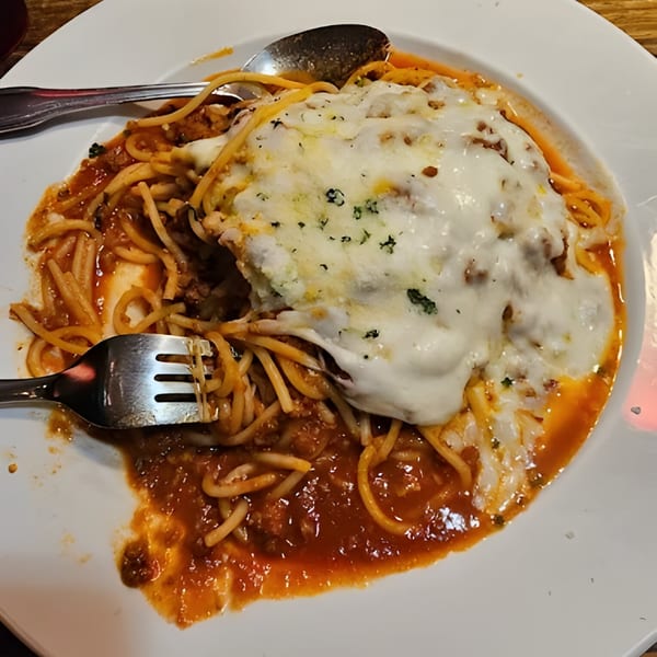Arianna's Italian Grill Lakeside's baked spaghetti with meat sauce and melted mozzarella cheese.
